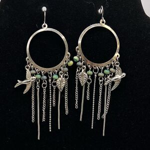 *3/$20* Detailed silver tone hoop earrings with bird leaf and bead accents
